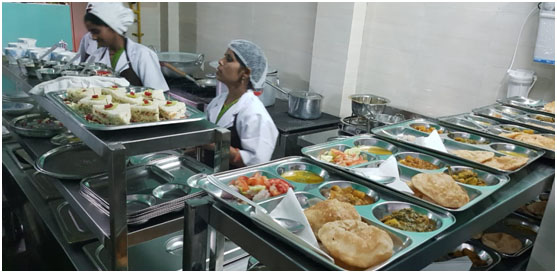 Entrepreneurs displaying food in the canteen