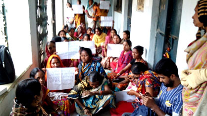 SHG women holding posters 